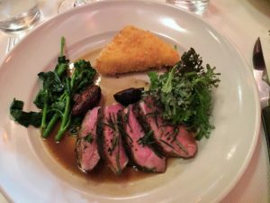 Grilled Sonoma County duck breast with fried sweet corn polenta, broccoli di Ciccio, and Black Mission figs.