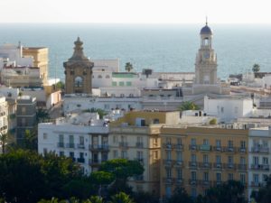 Cadiz is surrounded by water on three sides.